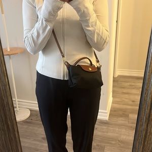 Longchamp pouch with top handle